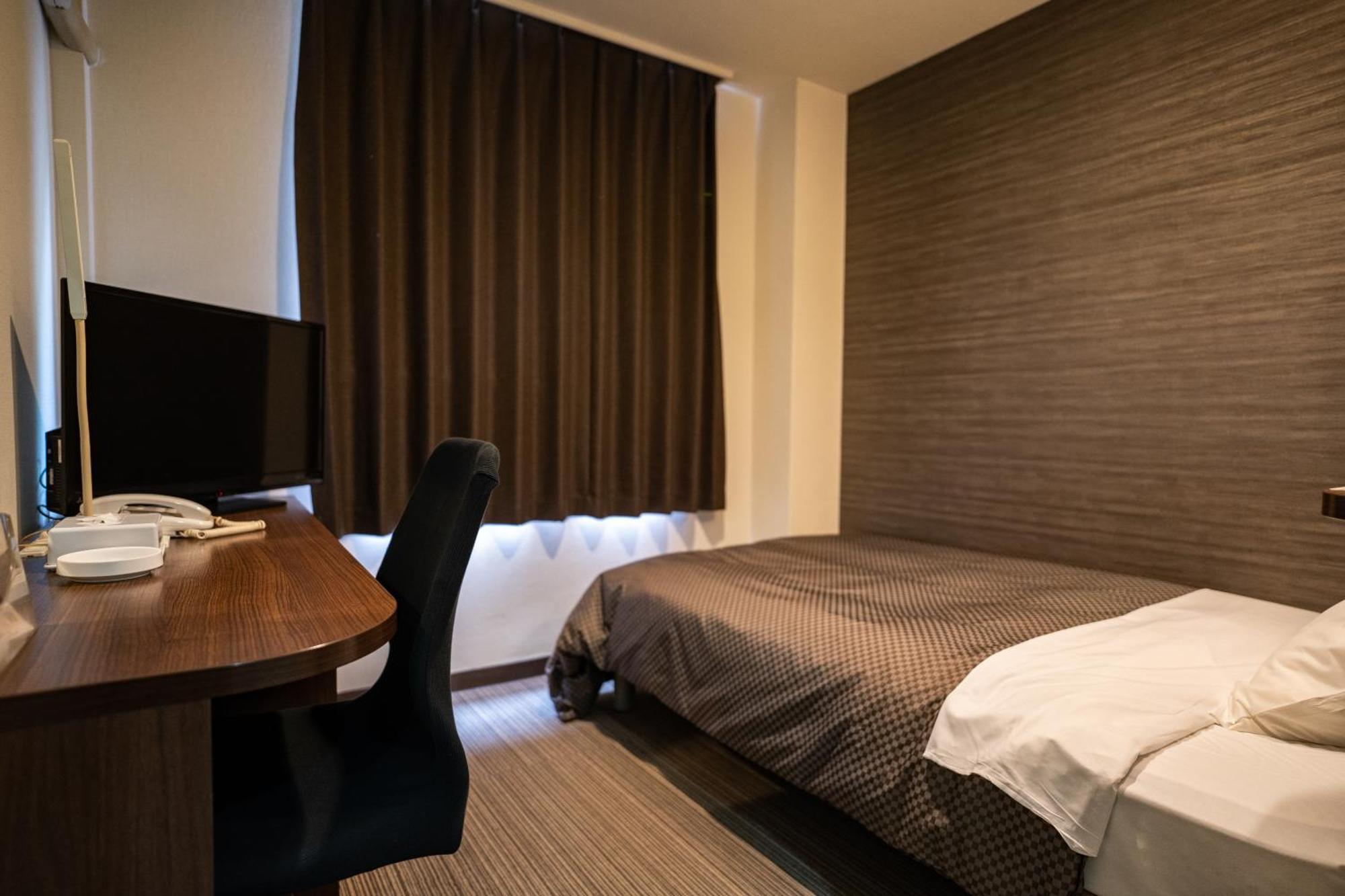 Isahaya Daiichi Hotel Bagian luar foto