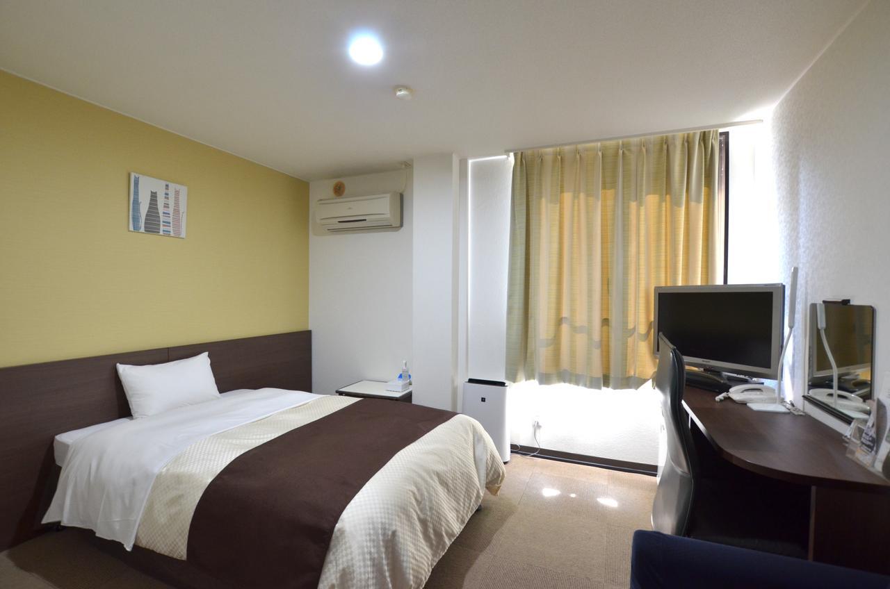 Isahaya Daiichi Hotel Bagian luar foto