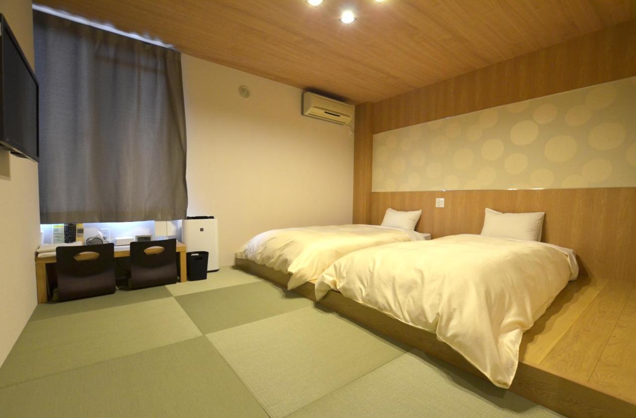 Isahaya Daiichi Hotel Bagian luar foto
